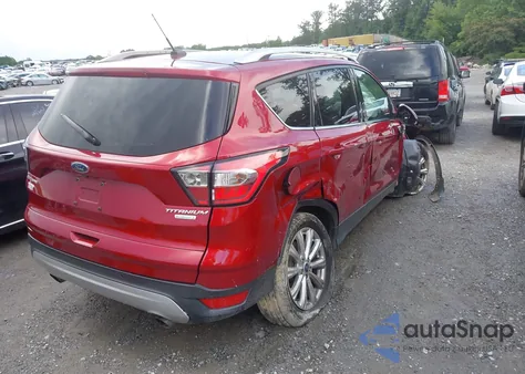 2017 Ford Escape Titanium z USA, uszkodzony, nr VIN 1FMCU0J96HUE29464